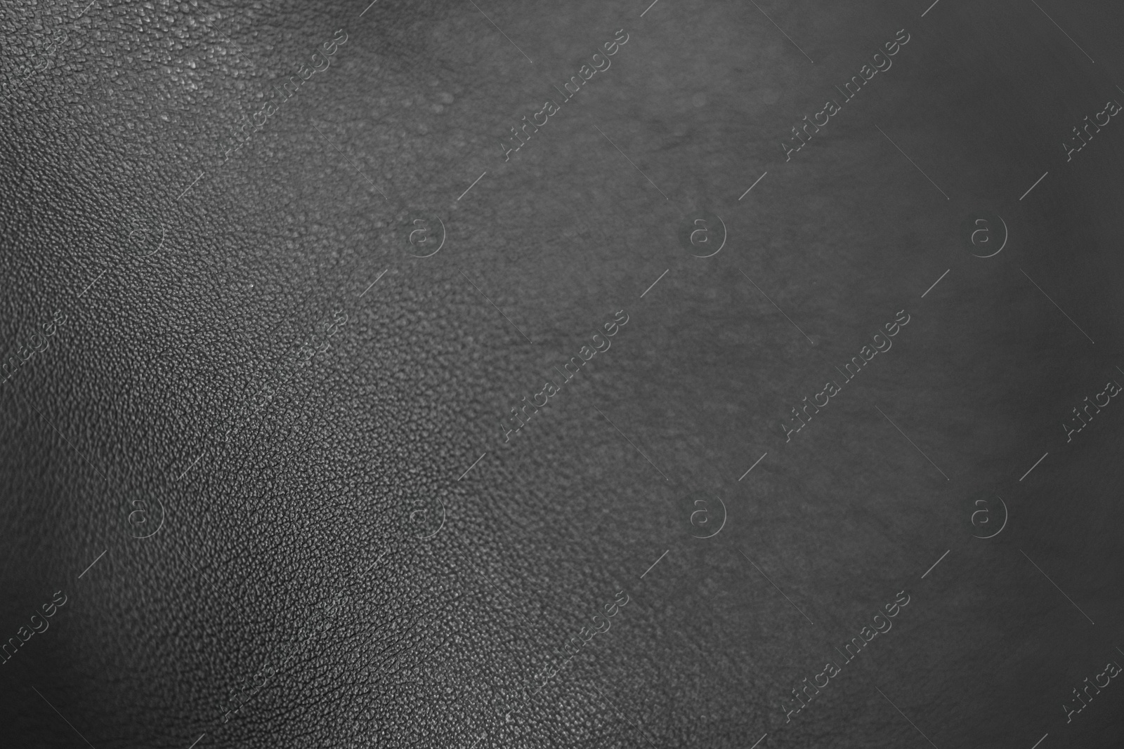 Image of Black leather, closeup view of material texture