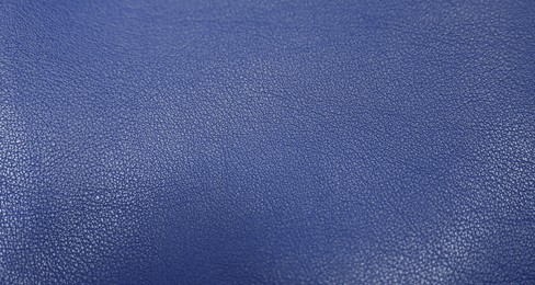 Image of Blue leather, closeup view of material texture. Banner design