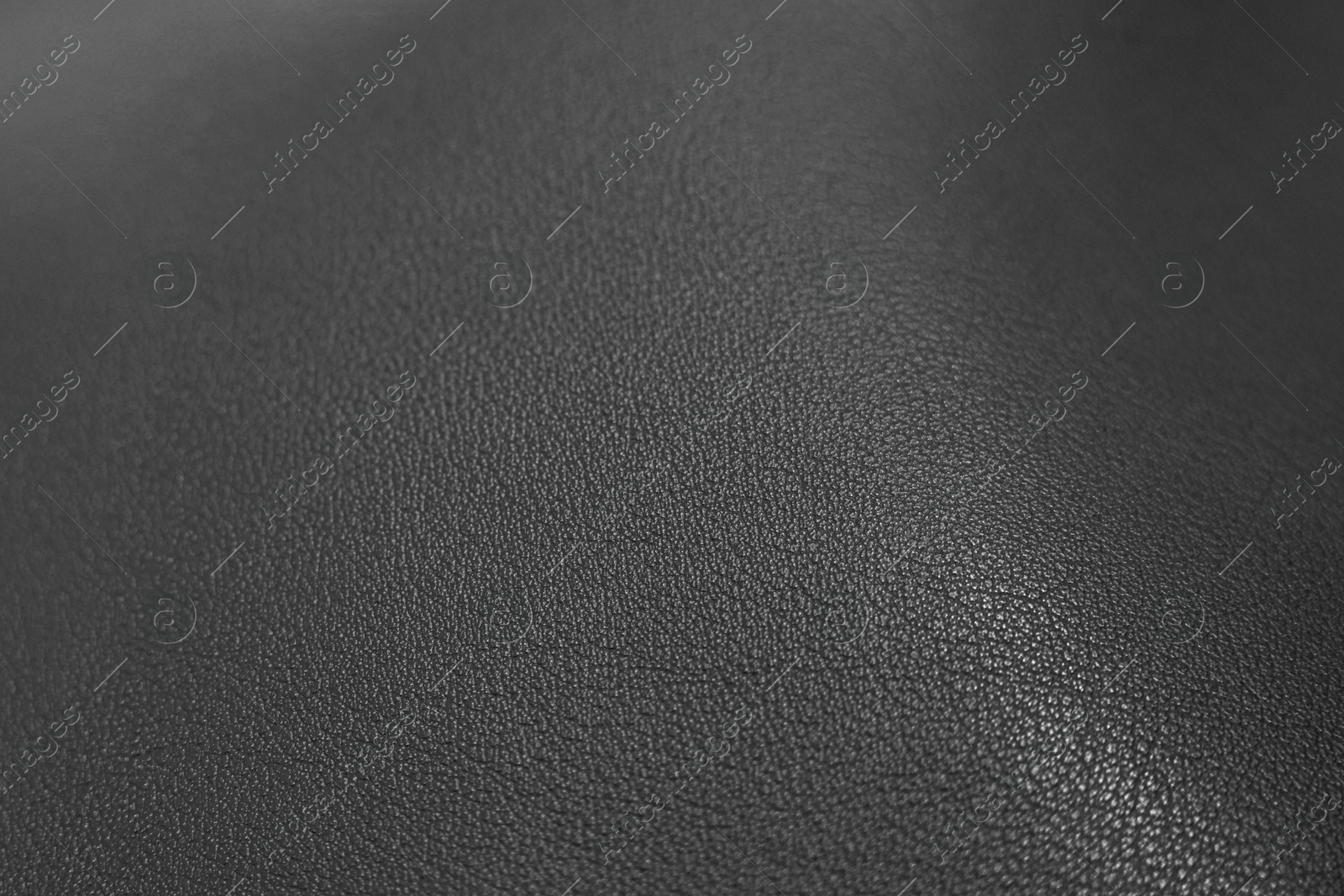 Image of Black leather, closeup view of material texture