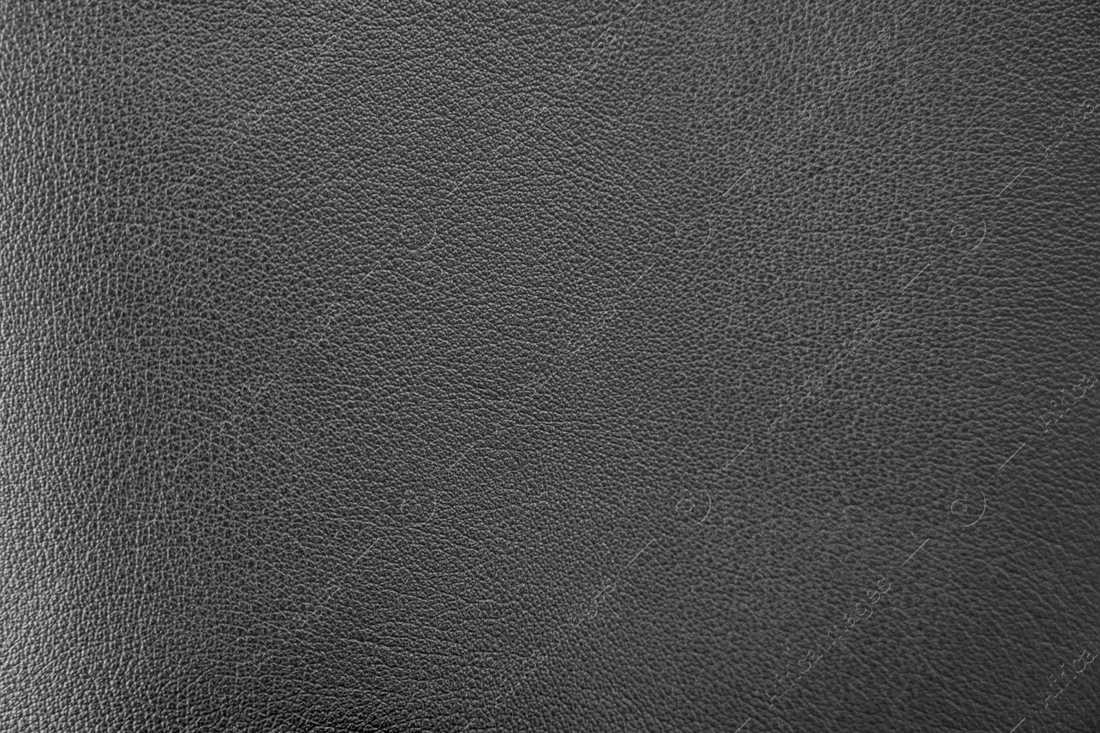 Image of Black leather, closeup view of material texture