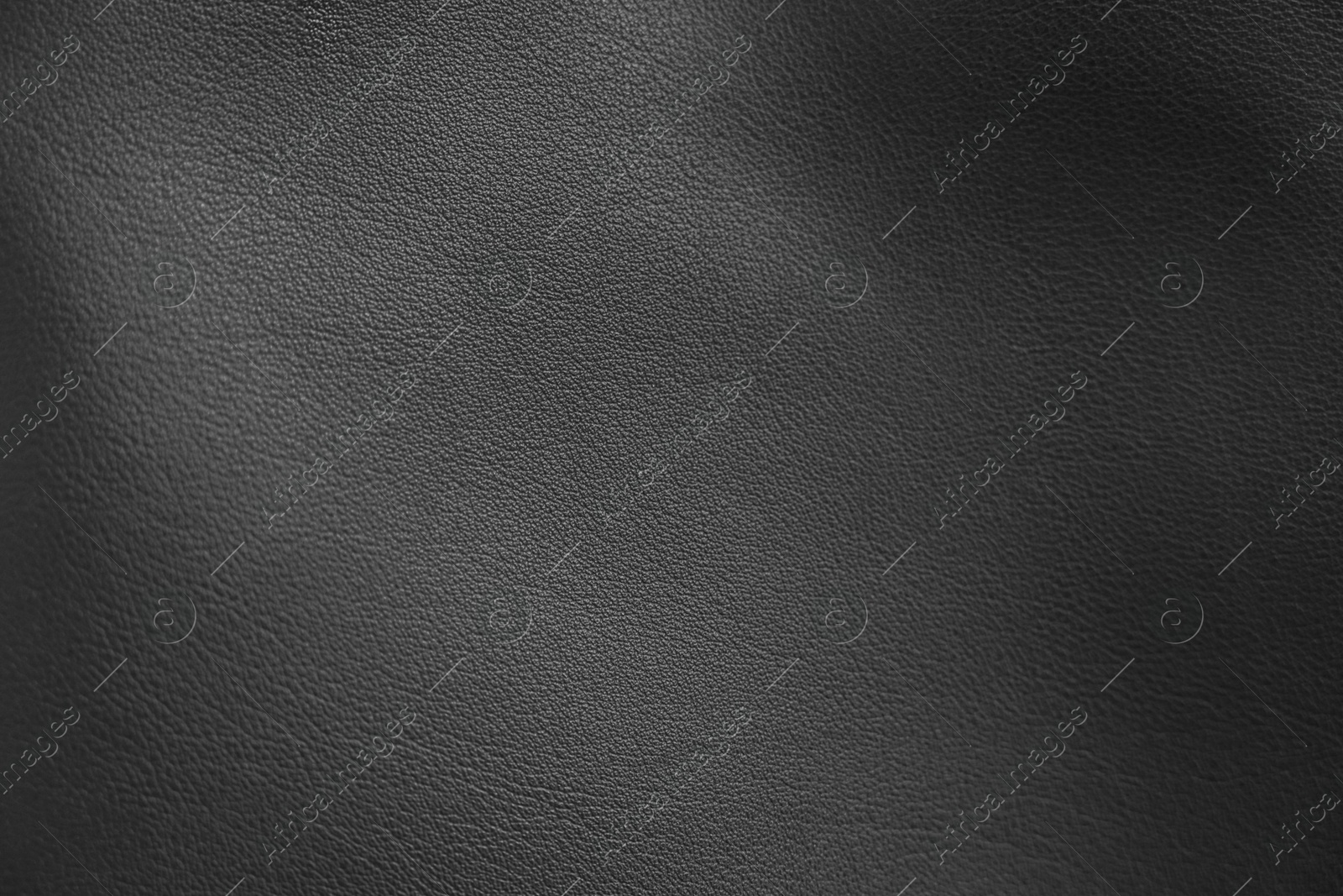 Image of Black leather, closeup view of material texture