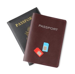 Photo of Passports and SIM cards isolated on white, top view