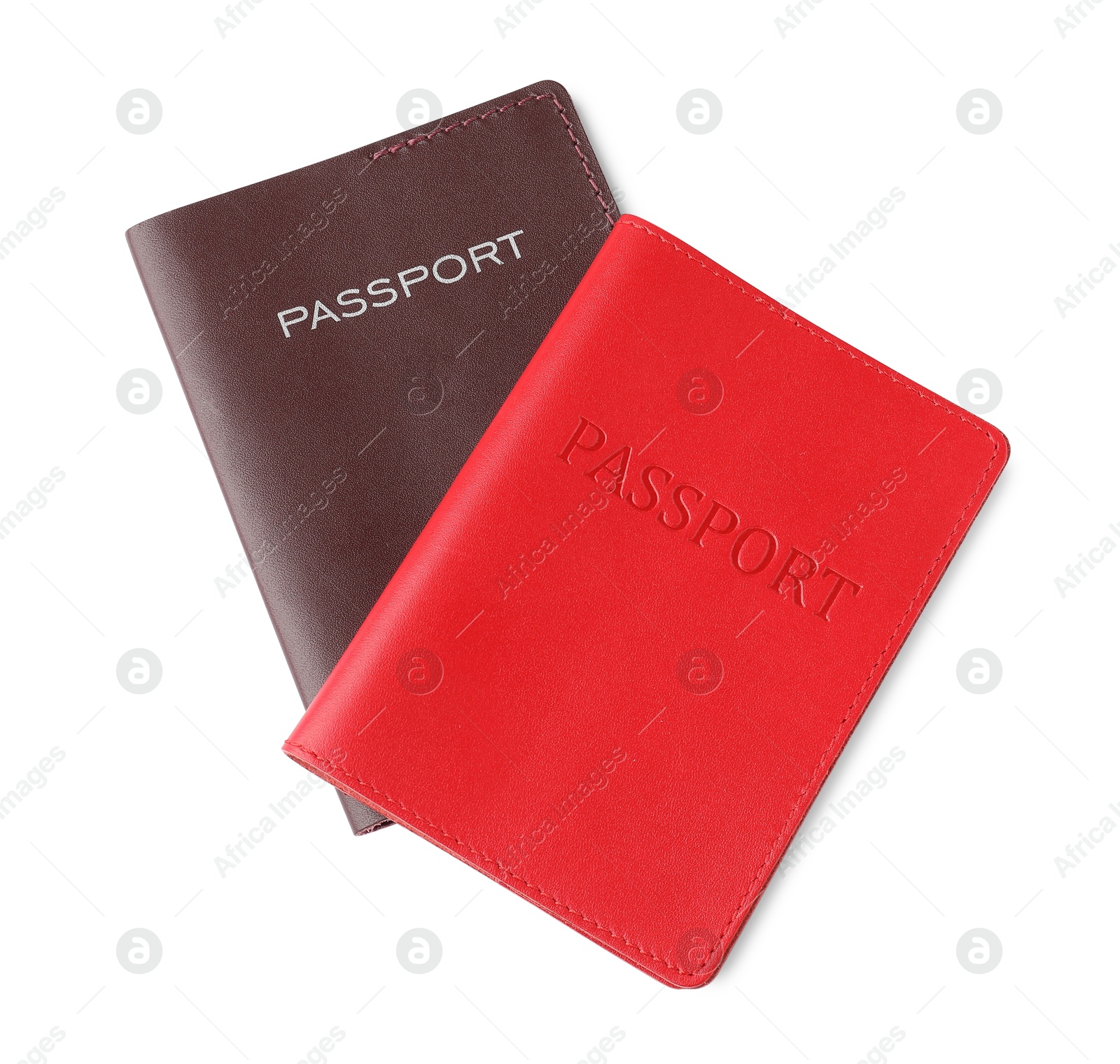 Photo of Two passports isolated on white, top view