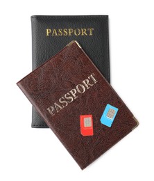 Photo of Passports and SIM cards isolated on white, top view