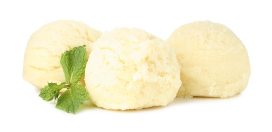 Scoops of melon sorbet and mint isolated on white