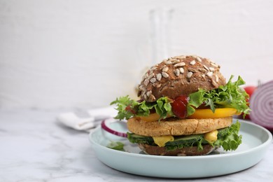 Photo of Delicious vegan burger with chickpea cutlet on white marble table. Space for text