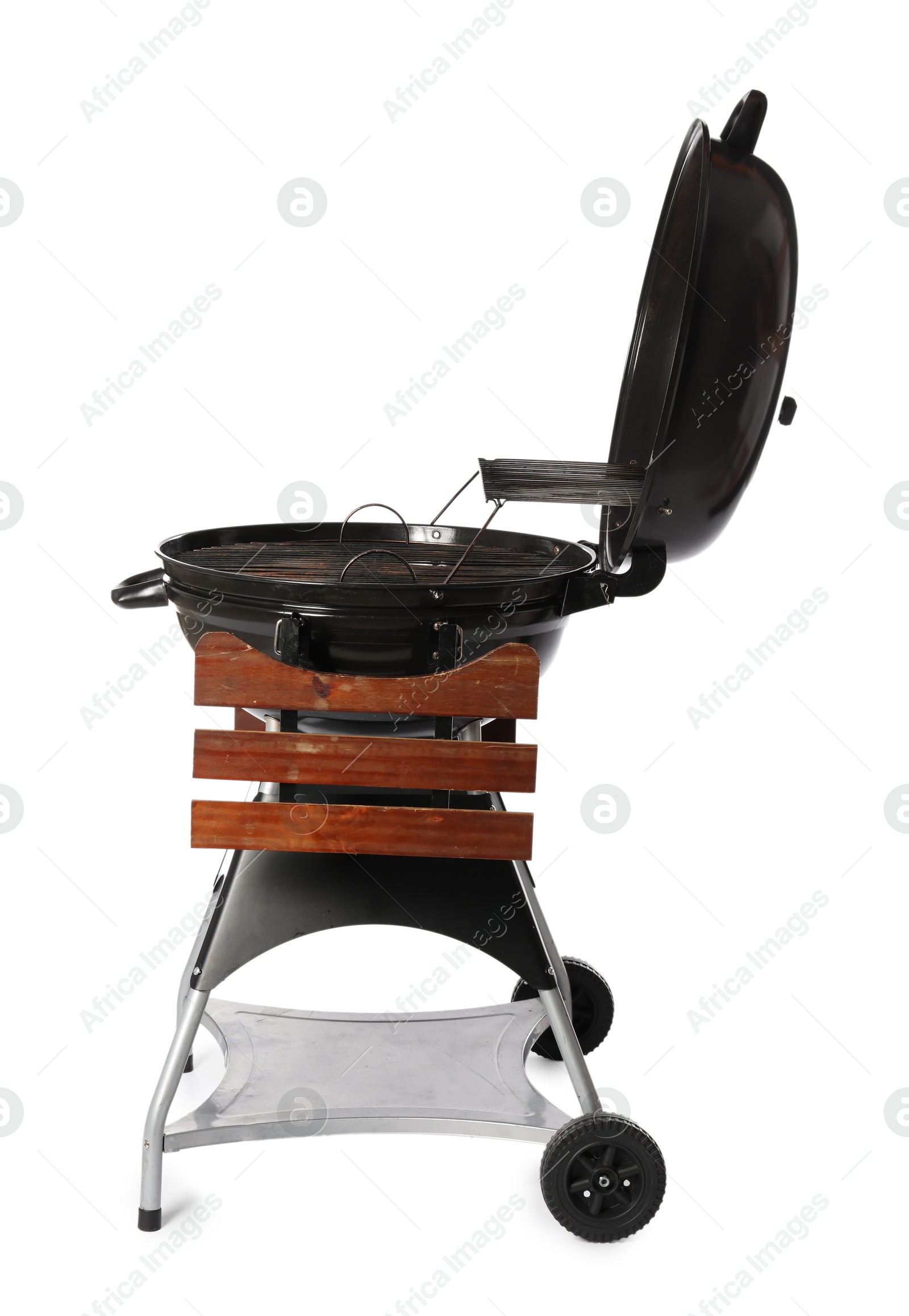 Photo of One black barbeque grill isolated on white. Cooking appliance