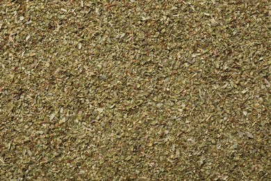 Dried oregano as background, top view. Aromatic herb