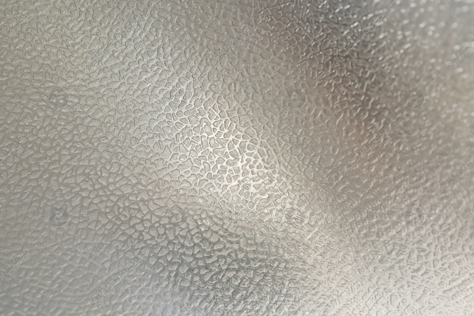 Photo of Shiny silver surface as background, closeup view