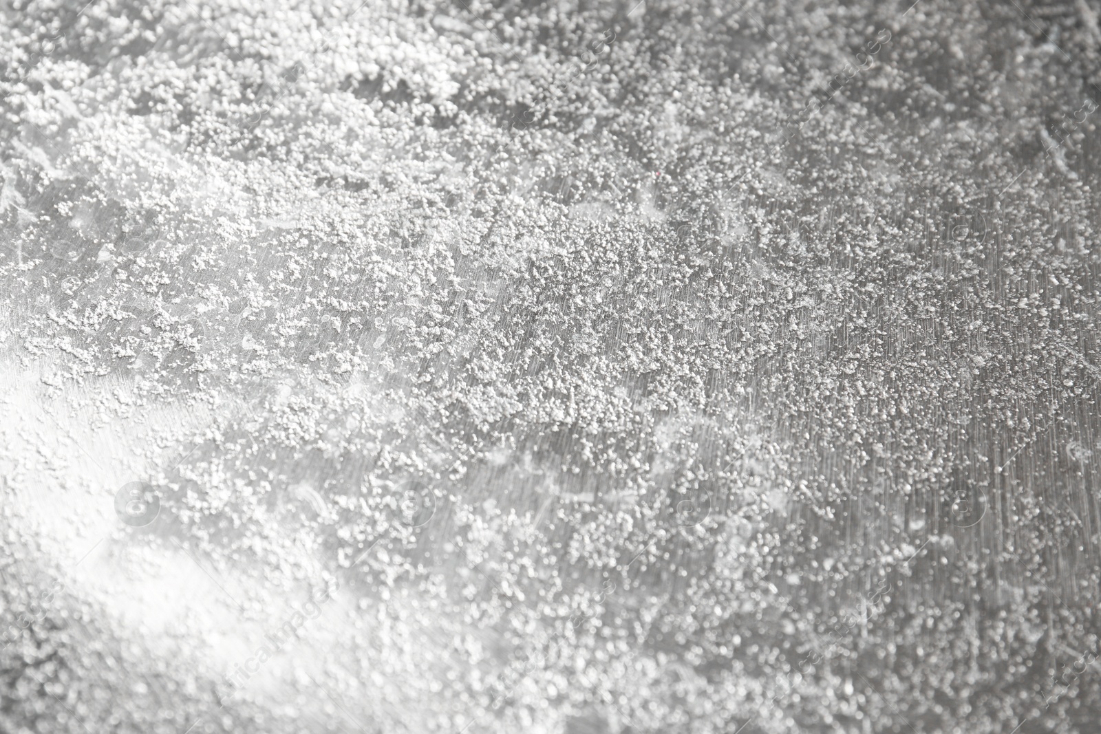 Photo of Shiny silver surface as background, closeup view