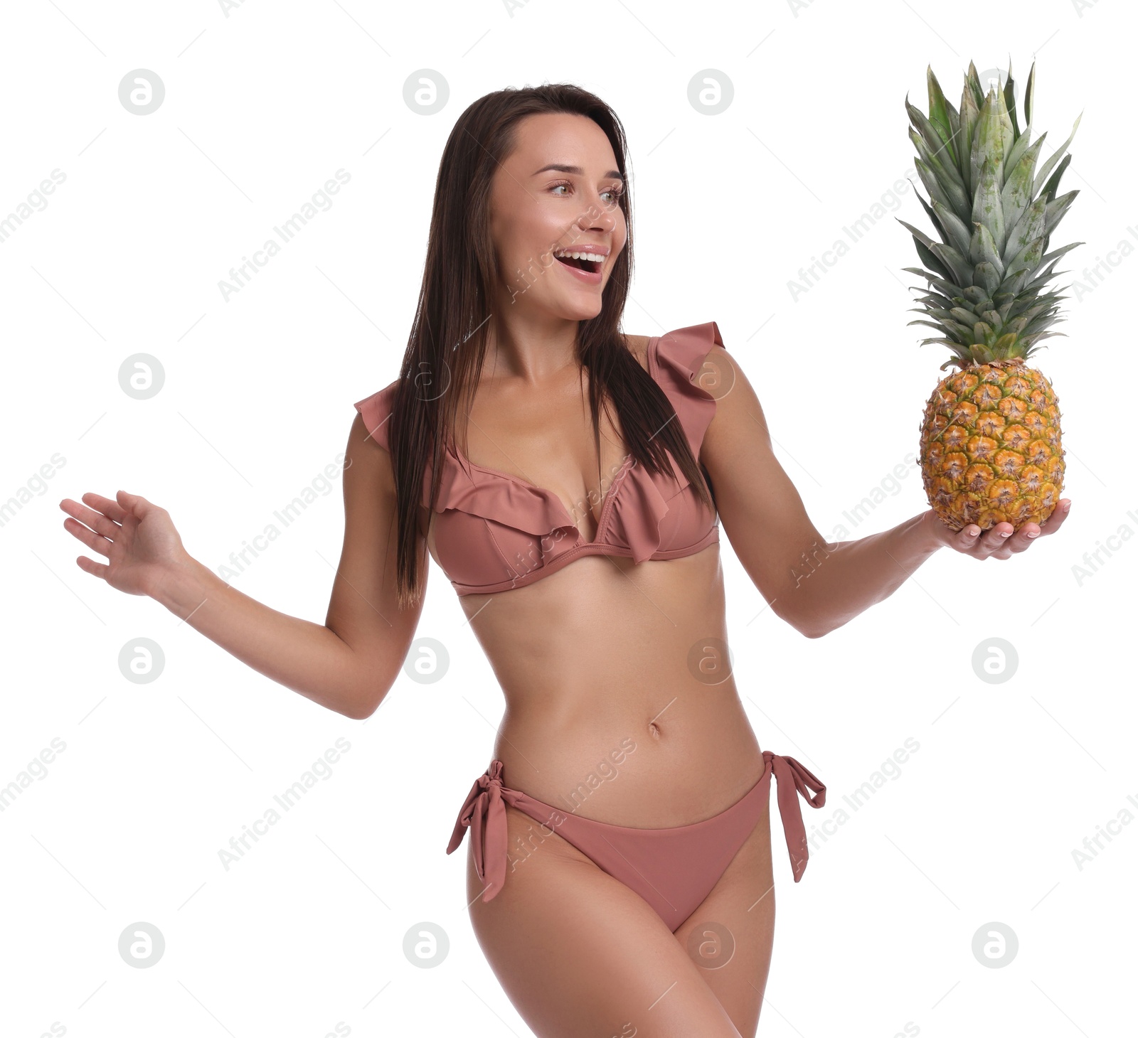 Photo of Attractive woman in bikini with fresh pineapple on white background