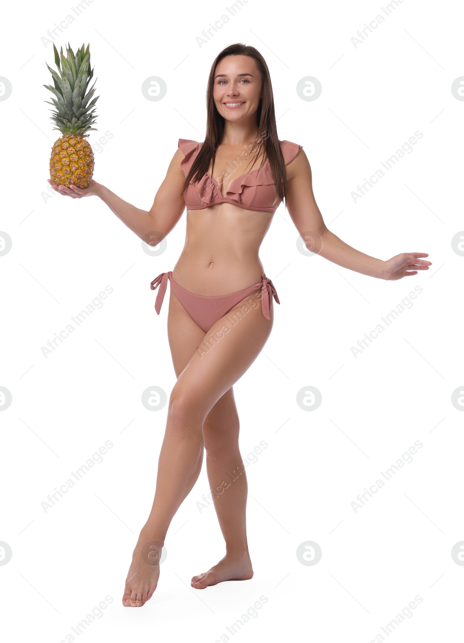 Photo of Woman in bikini with fresh pineapple on white background