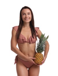 Photo of Attractive woman in bikini with fresh pineapple on white background