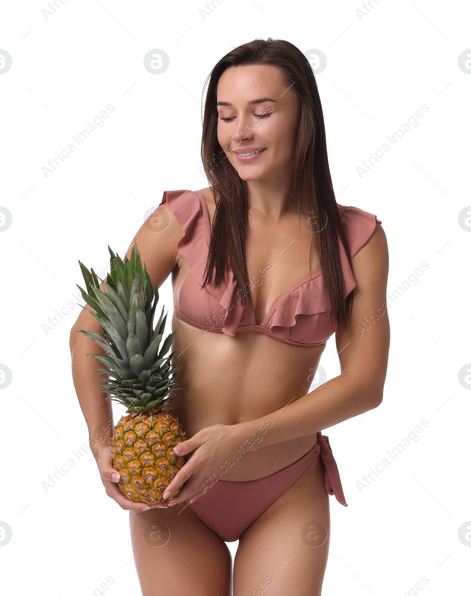 Photo of Attractive woman in bikini with fresh pineapple on white background