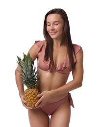 Photo of Attractive woman in bikini with fresh pineapple on white background