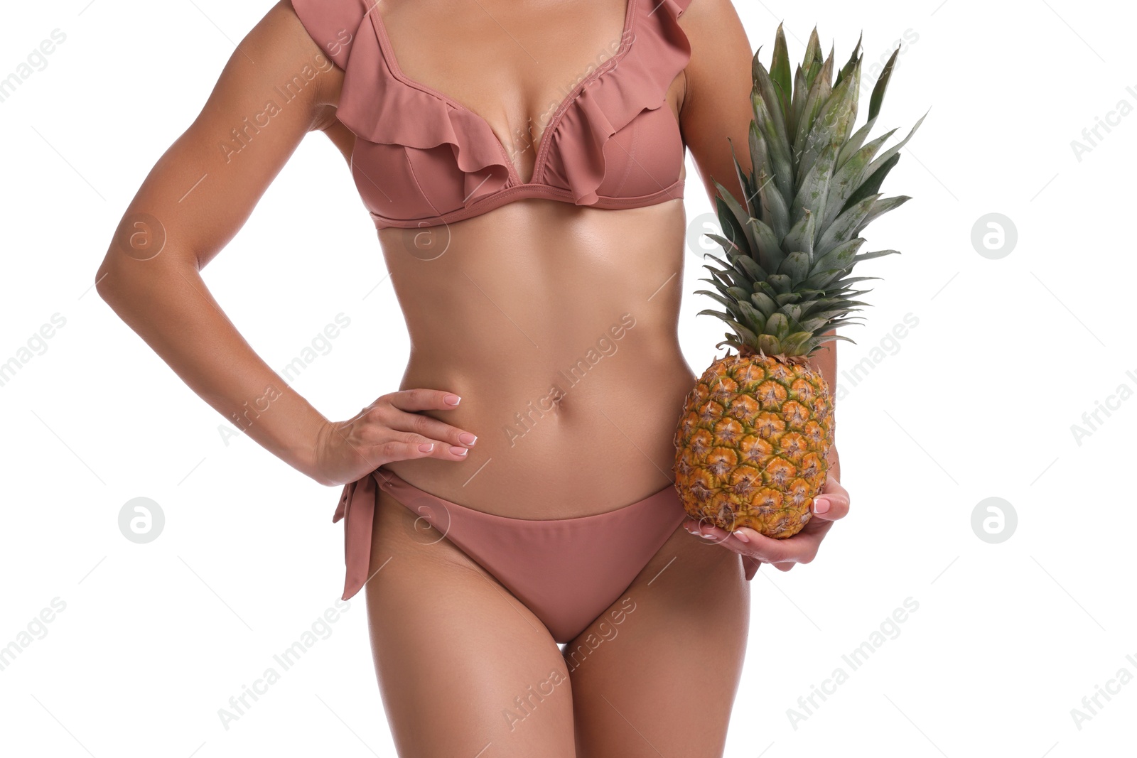 Photo of Woman in bikini with fresh pineapple on white background, closeup