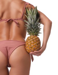 Photo of Woman in bikini with fresh pineapple on white background, closeup