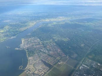 Photo of Picturesque view of city through plane window during flight