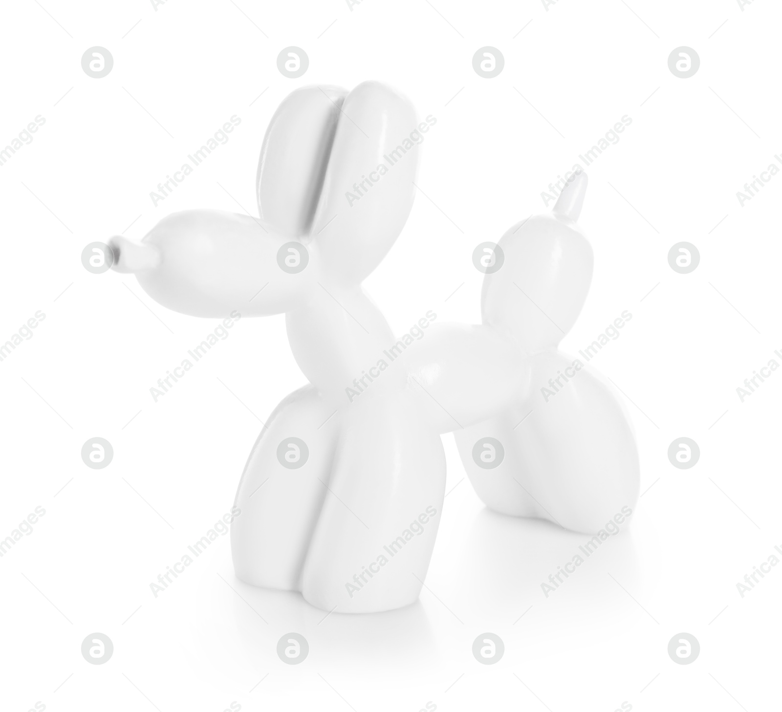 Photo of Decorative figure in shape of balloon dog isolated on white