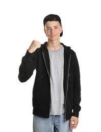 Portrait of teenage boy on white background