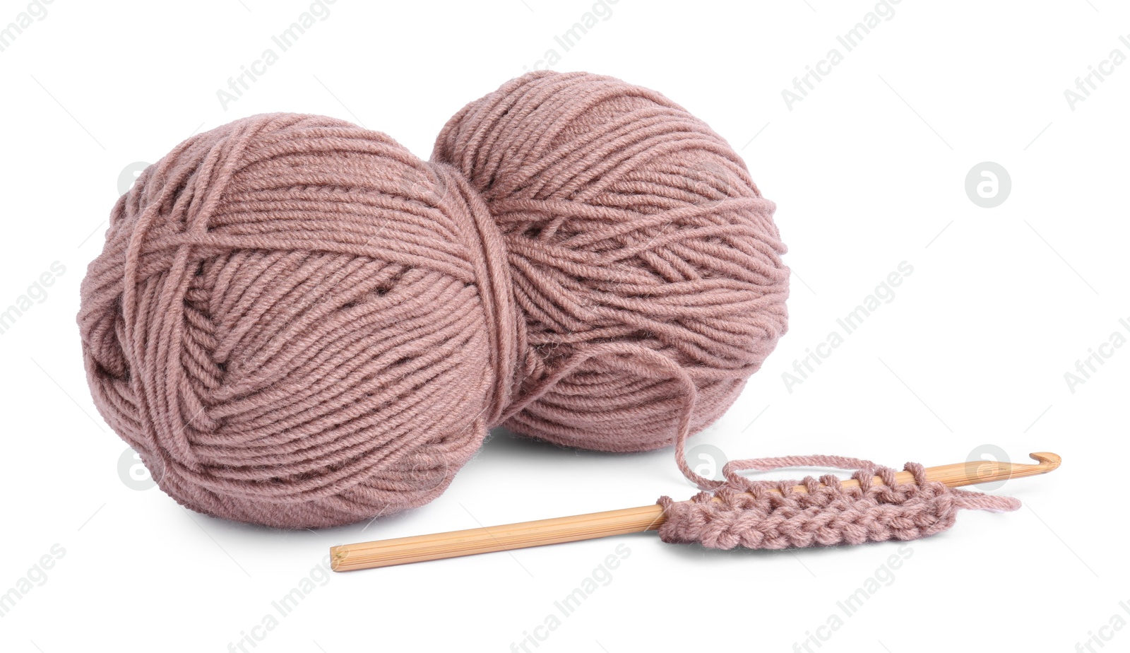 Photo of Skein of yarn, pattern sample and crochet hook isolated on white