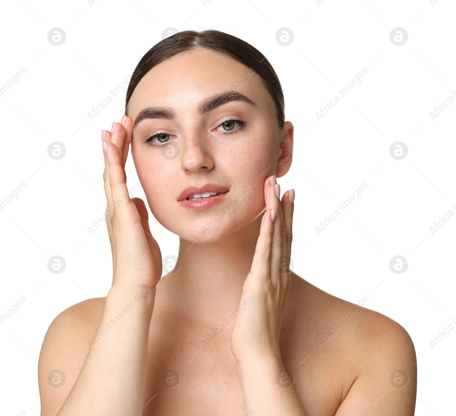 Photo of Beautiful young woman doing facial massage on white background