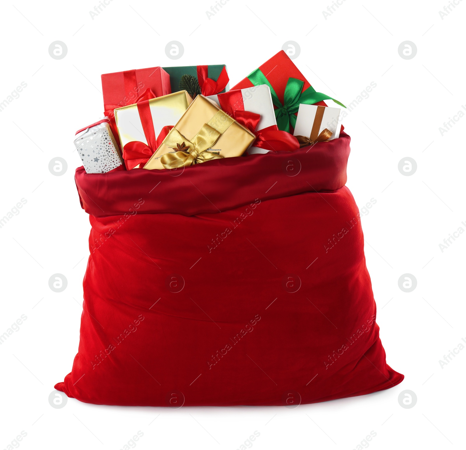 Photo of Santa Claus bag with gift boxes isolated on white