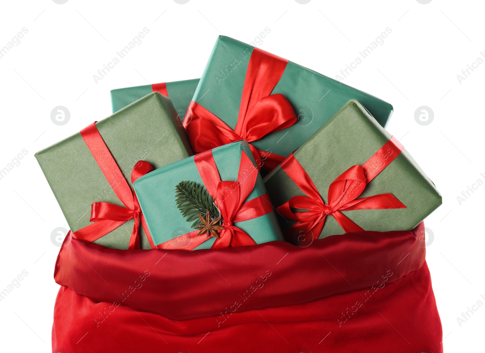 Photo of Santa Claus bag with gift boxes isolated on white