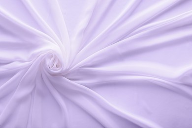 Image of Beautiful lavender color tulle, closeup view of fabric