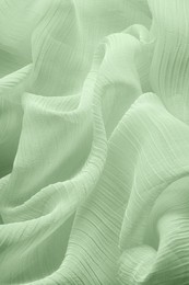 Beautiful pale green tulle, closeup view of fabric