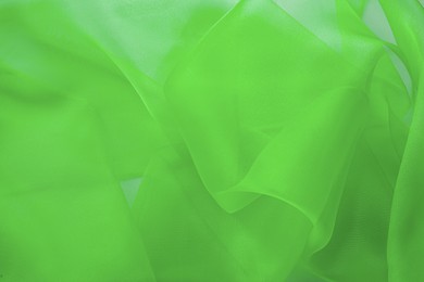 Image of Beautiful chartreuse color tulle, closeup view of fabric