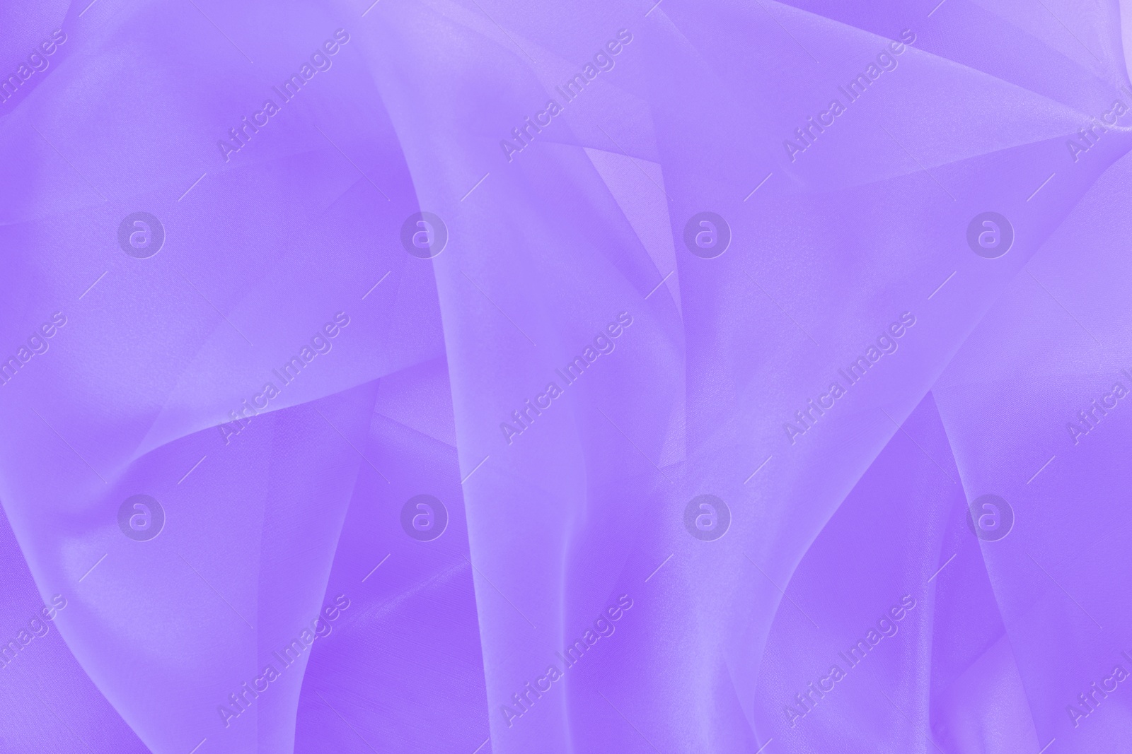 Image of Beautiful blue violet tulle, closeup view of fabric