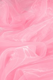 Image of Beautiful pink tulle, closeup view of fabric