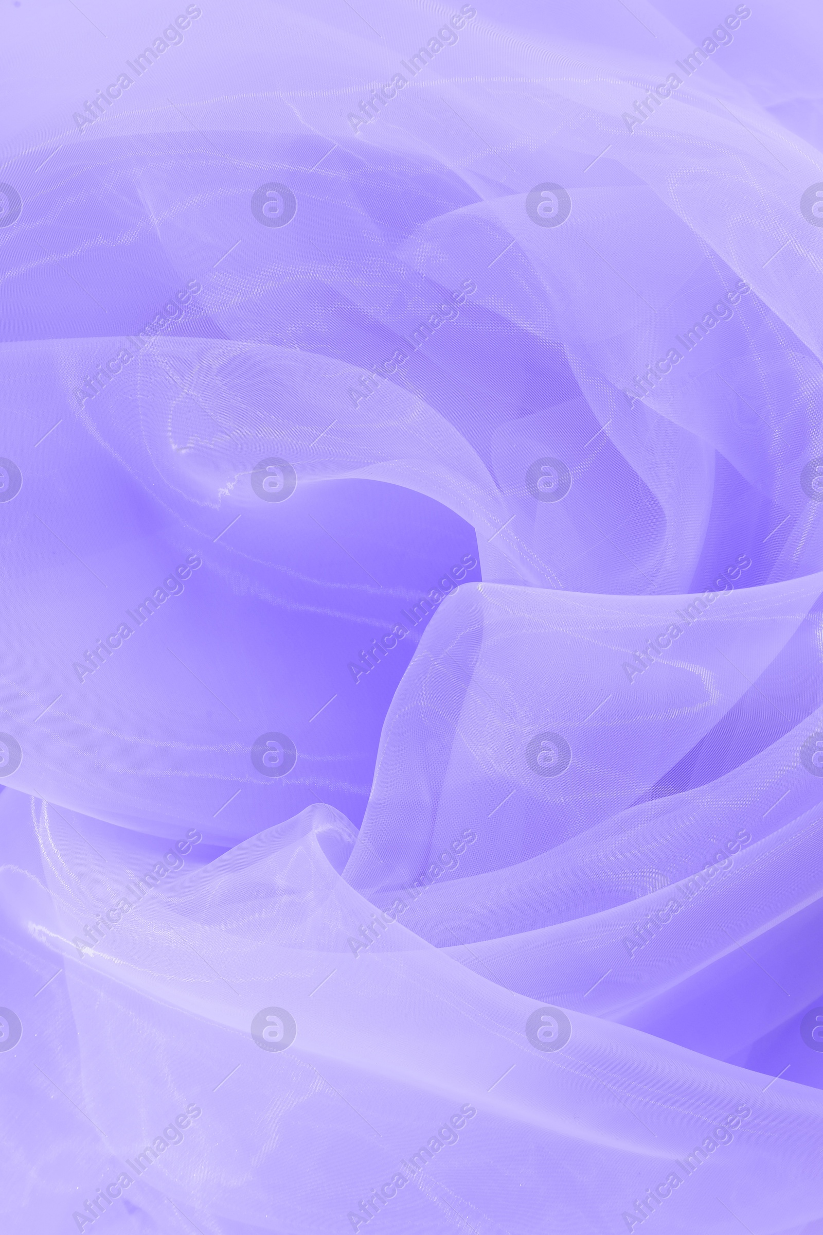 Image of Beautiful blue violet tulle, closeup view of fabric