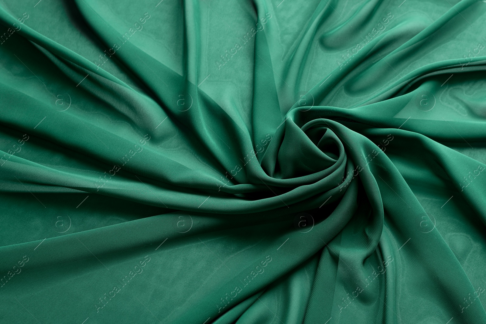 Image of Beautiful sea green color tulle, closeup view of fabric