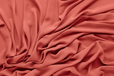 Beautiful coral color tulle, closeup view of fabric