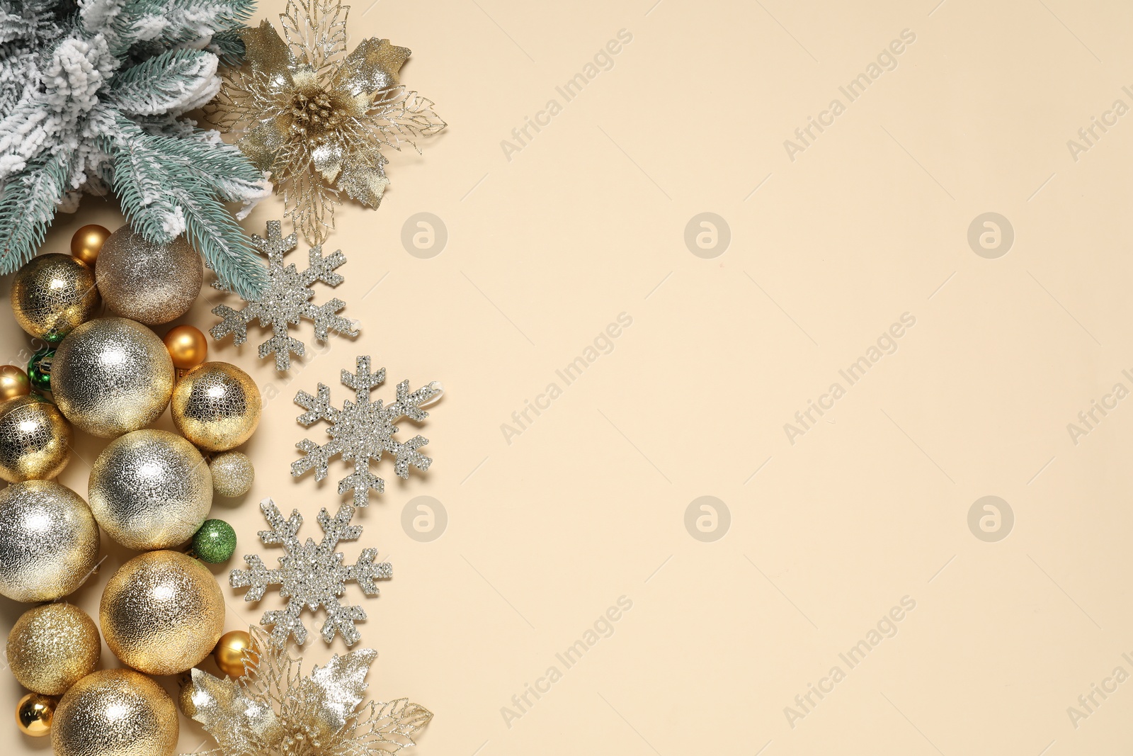 Photo of Different Christmas decor on beige background, flat lay. Space for text