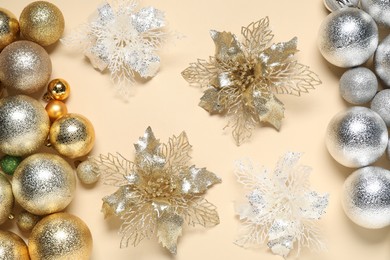 Photo of Different Christmas decor on beige background, flat lay