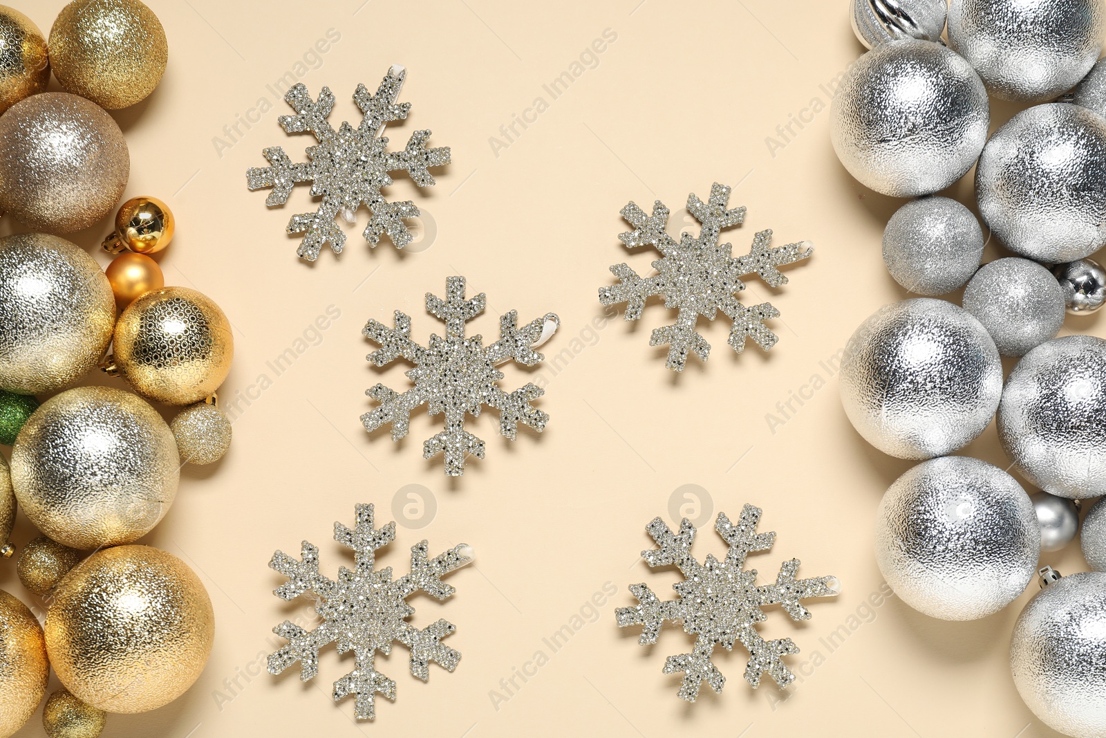 Photo of Different Christmas decor on beige background, flat lay