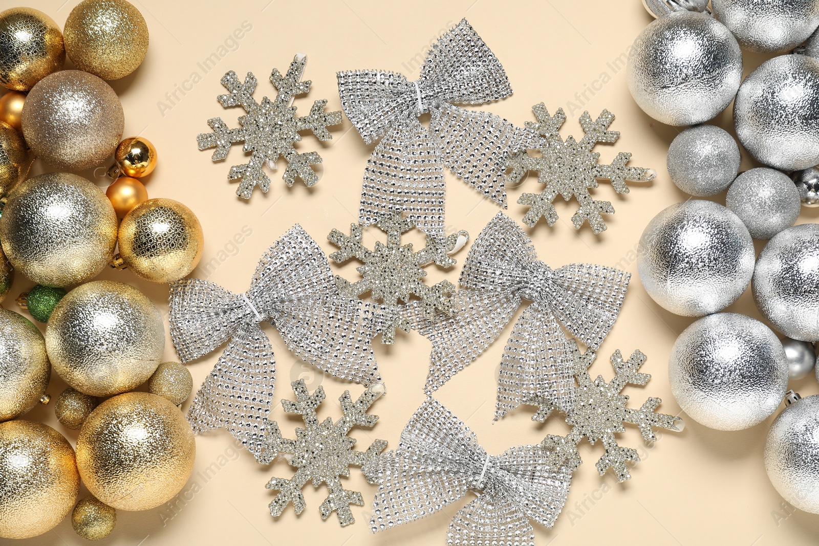 Photo of Different Christmas decor on beige background, flat lay