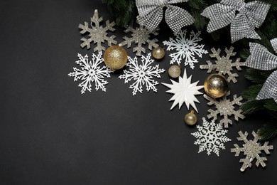 Photo of Different Christmas decor on black background, flat lay. Space for text