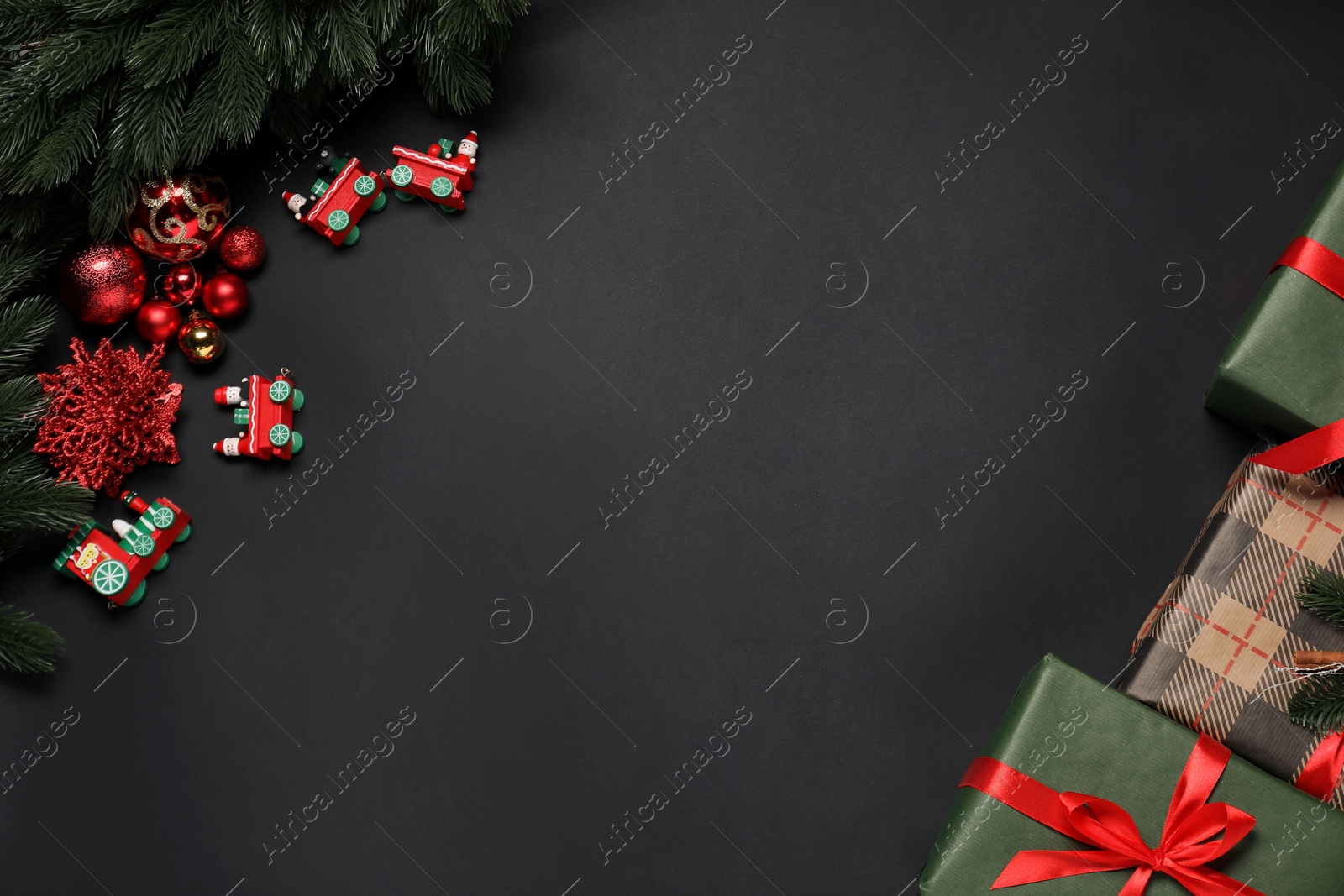 Photo of Different Christmas decor on black background, flat lay. Space for text