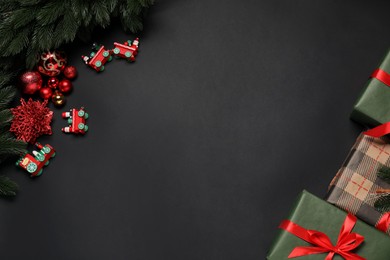 Photo of Different Christmas decor on black background, flat lay. Space for text