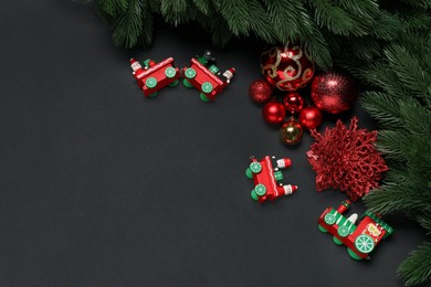 Photo of Different Christmas decor on black background, flat lay. Space for text