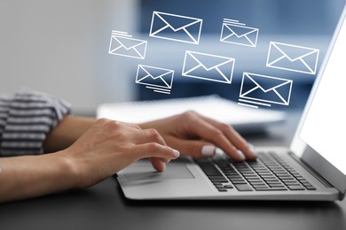 Image of Woman using laptop at table, closeup. Illustrations of envelope over computer