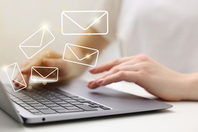 Image of Woman using laptop at table, closeup. Illustrations of envelope over computer