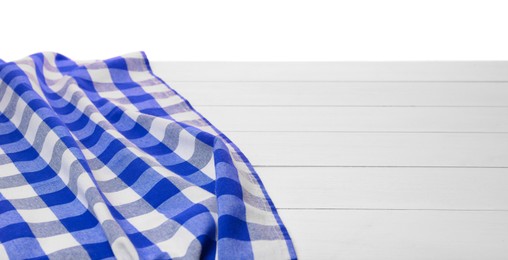 Image of Blue checkered gingham fabric on white wooden table