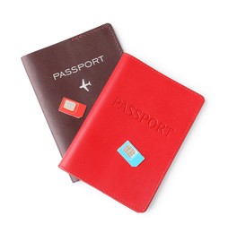 Photo of Passports and SIM cards isolated on white, top view