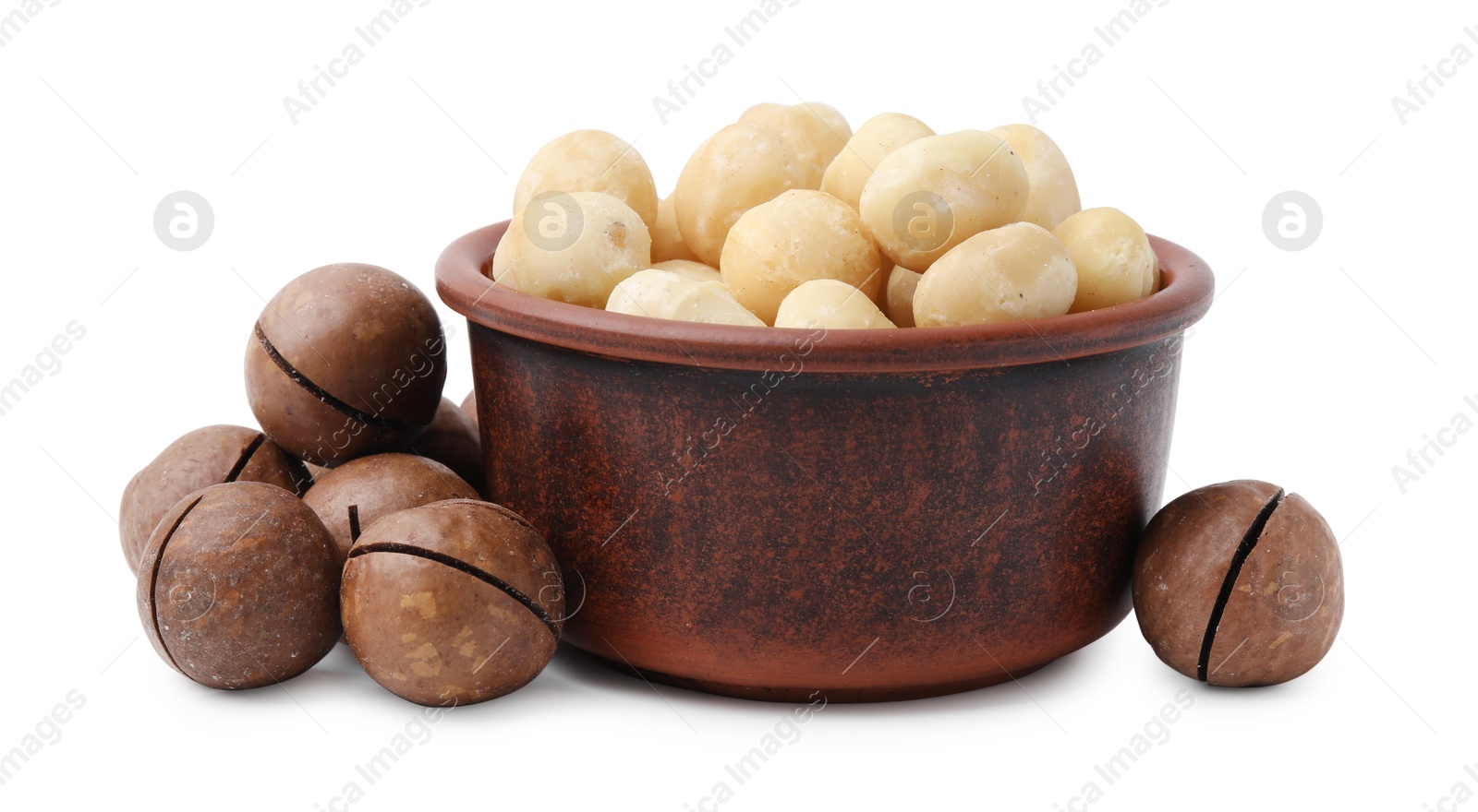 Photo of Macadamia nuts in bowl isolated on white