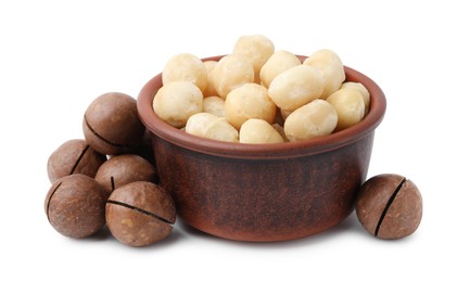 Photo of Macadamia nuts in bowl isolated on white